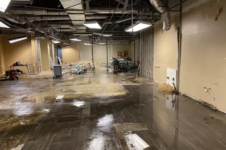 Restoration work underway inside a commercial building after a water loss